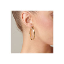 Load image into Gallery viewer, uno de 50 ohmmm� 5mm earrings in metal  clad with gold
