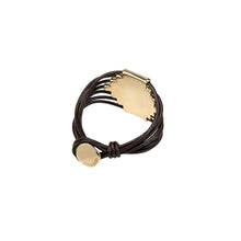 Load image into Gallery viewer, uno de 50 attached 7-brown leather strap bracelet and gold-plated metal alloy 7-cast tubule charm  and button clasp
